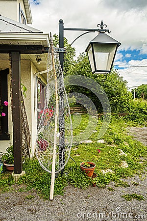 Sculpure of a hand made leaf in front of The Forge Ã  Pique-Assaut Ile d`Orleans Stock Photo